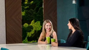 People enjoying smoothies, highlighting essential nutrients like proteins, carbohydrates, and fats for health and energy.
